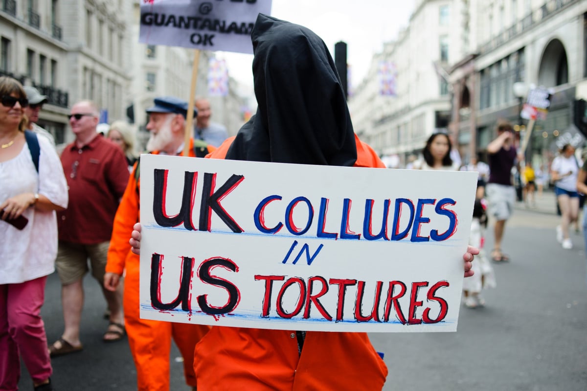 A demonstrator dressed in orange prison scrubs attends a mass demonstration opposing the UK visit of President Donald Trump in London, England, on July 13, 2018.