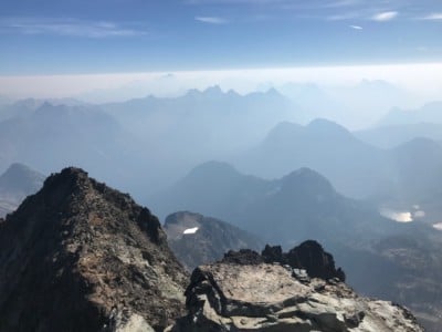 Smoke from wildfires in British Columbia, Eastern Washington and Montana enshrouds the Cascade Mountains of Washington State. In the Pacific Northwest, experiencing weeks on end of wildfire smoke during the summer months has become the “new normal.”