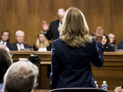 Dr. Christine Blasey Ford is sworn in by Chairman Chuck Grassley on Capitol Hill, September 27, 2018, in Washington, DC.