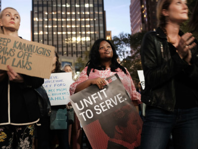 Women attend a rally and vigil in front of a Brooklyn court house calling to stop the nomination of Supreme Court candidate Judge Brett Kavanaugh on October 3, 2018, in New York City.