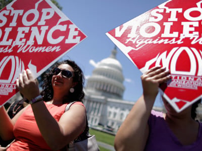 Members of the The National Organization for Women, the National Task Force to End Sexual Assault and Domestic Violence Against Women and other groups hold a rally in support of the Violence Against Women Act on Capitol Hill, June 26, 2012, in Washington, DC.