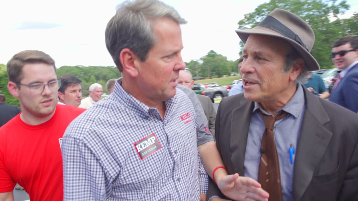 Journalist Greg Palast confronts GOP candidate for Governor of Georgia Brian Kemp outside the Sprayberry Barbecue in Newman, Georgia, asking, “Mr. Kemp are you removing Black voters from the voter rolls just so you can win this election?”