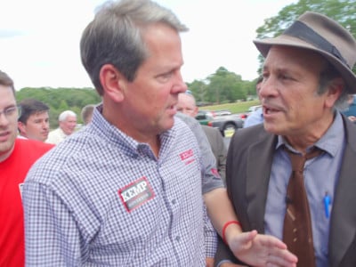Journalist Greg Palast confronts GOP candidate for Governor of Georgia Brian Kemp outside the Sprayberry Barbecue in Newman, Georgia, asking, “Mr. Kemp are you removing Black voters from the voter rolls just so you can win this election?”