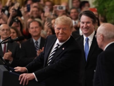 President Trump speaks as Supreme Court Justice Brett Kavanaugh and retired Justice Anthony Kennedy look on during Kavanaugh's ceremonial swearing in at the east room of the White House on October 8, 2018, in Washington, DC.