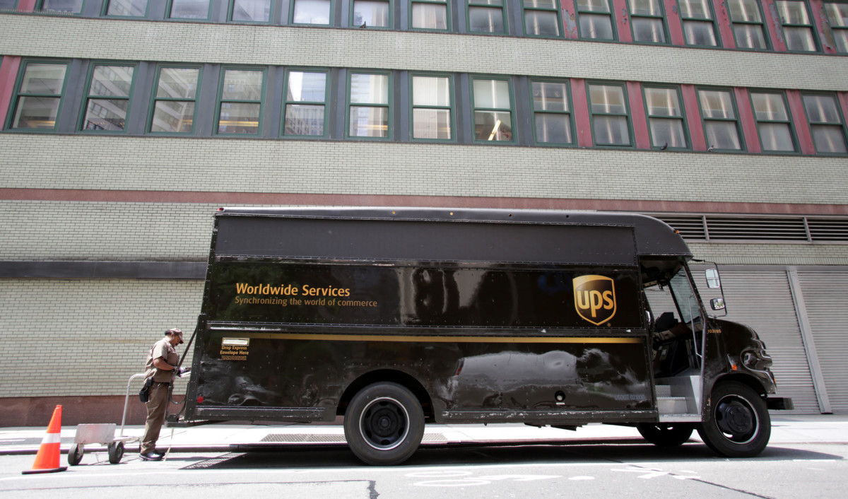 UPS driver with delivery van