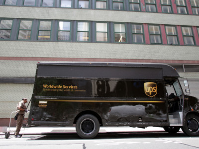 UPS driver with delivery van