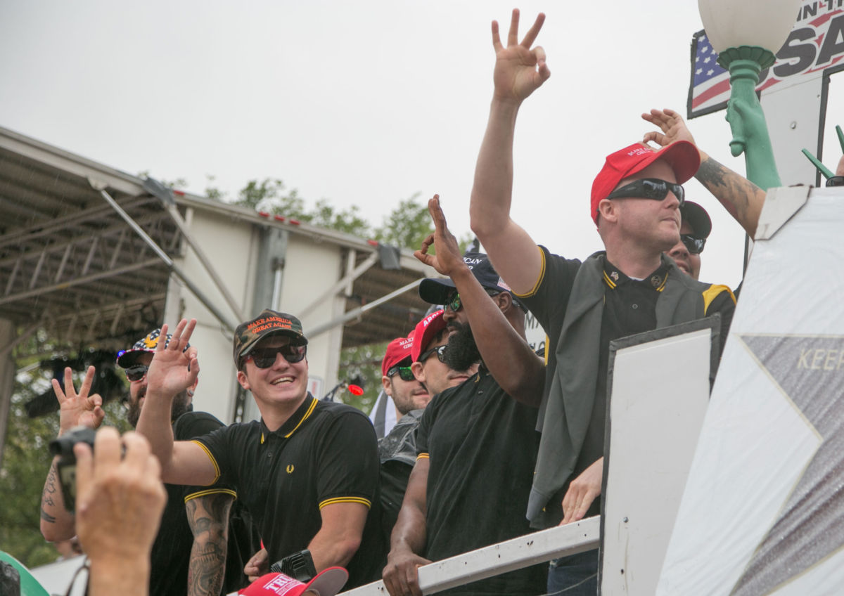 Proud Boys pose for photos during the "Mother of All Rallies" at the National Mall in Washington, DC, on September 8, 2018.