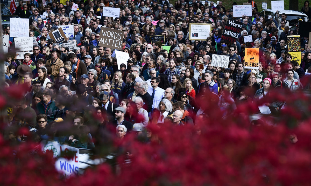 An estimated 4,000 people held a solidarity march and protest against Donald Trump's presence in the Squirrel Hill neighborhood on October 30, 2018, in Pittsburgh, Pennsylvania.
