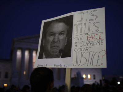 Protesters demonstrate against Supreme Court Justice Brett Kavanaugh outside the US Supreme Court on October 3, 2018, in Washington, DC.