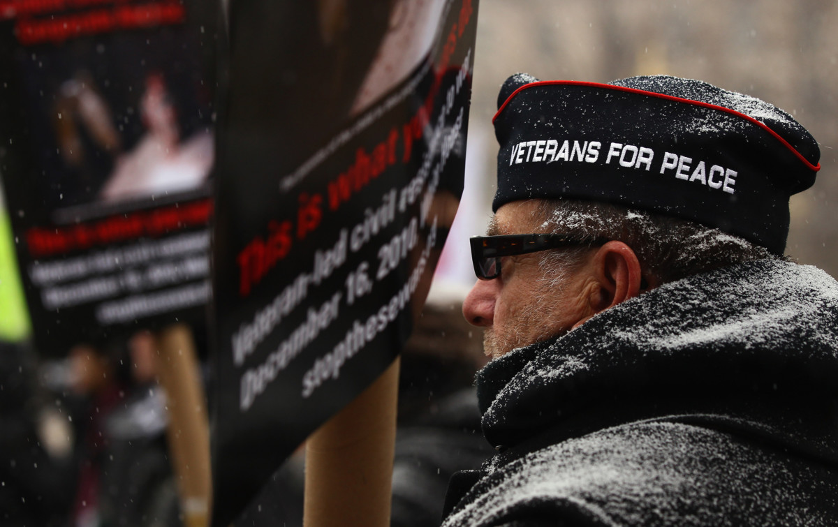 Dave Hancock, a veteran from the war in Vietnam, participates in an antiwar protest in front of the White House December 16, 2010, in Washington, DC.