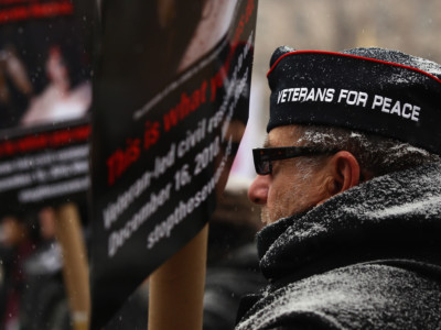 Dave Hancock, a veteran from the war in Vietnam, participates in an antiwar protest in front of the White House December 16, 2010, in Washington, DC.