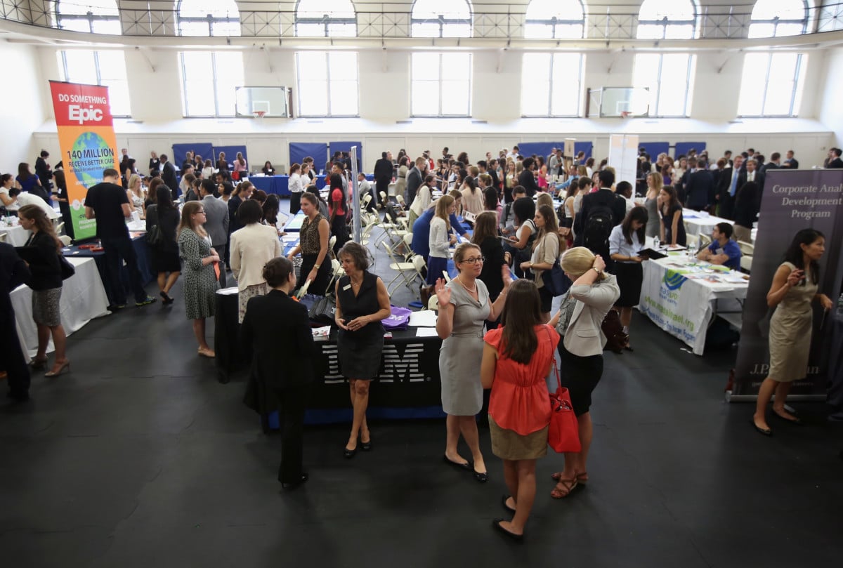 College students and potential employers meet at the Barnard College Career Fair on September 7, 2012, in New York City