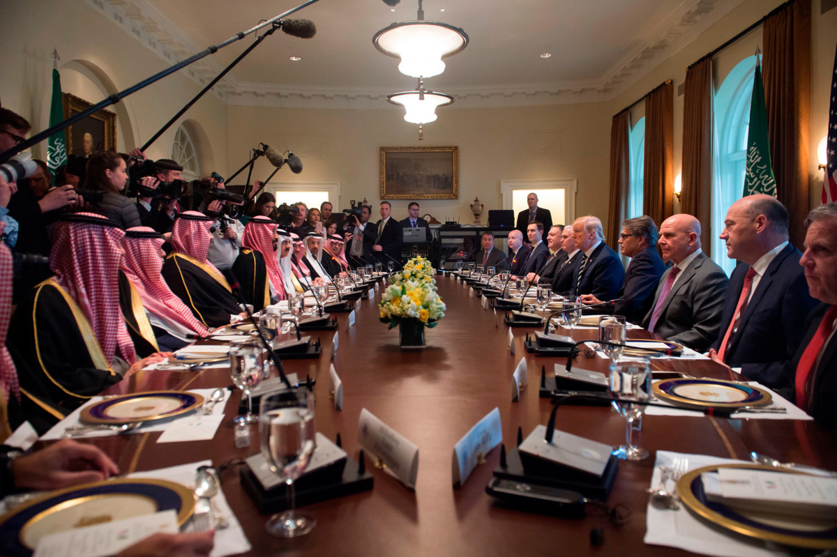 Donald Trump holds a lunch meeting with Saudi Arabia's Crown Prince Mohammed bin Salman (center left) and members of his delegation in Washington, DC, on March 20, 2018.