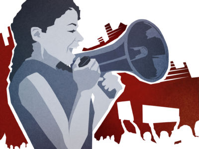 A woman holds a megaphone in front of a mass gathering of resistors.