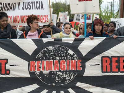 Progressives got out the vote; now begins the hard work of transforming our political expectations and demands. Activists from the Resist Reimagine Rebuild Coalition march on May 1, 2017, in Chicago to draw the connections between racial and economic justice.