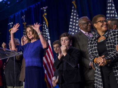 House Minority Leader Nancy Pelosi, joined by House Democrats, leaves the podium after delivering remarks during a DCCC election watch party at the Hyatt Regency on November 6, 2018, in Washington, DC.