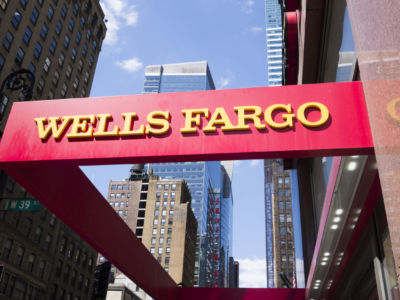 Wells Fargo's CEO describes the company as having an "excess of capital," despite the fact that it is laying off workers, outsourcing jobs, and continuing to pay its employees nearly poverty-level wages.