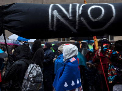 Activists rally to protest the Keystone XL pipeline and rally for Native American rights during the Native Nations Rise march on March 10, 2017, in Washington, DC.