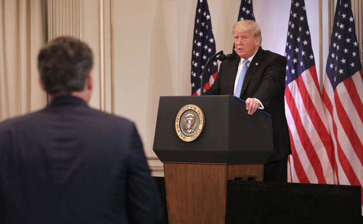 President Trump listens to a question from CNN's Jim Acosta at a press conference on September 26, 2018, in New York City.