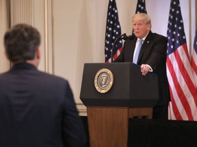 President Trump listens to a question from CNN's Jim Acosta at a press conference on September 26, 2018, in New York City.