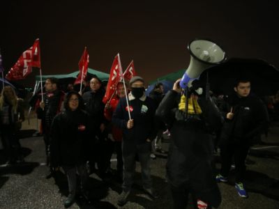 Workers from a Amazon logistics depot in Madrid, Spain walk out on Black Friday 2018