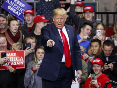 President Trump arrives at a campaign rally for Republican Senate candidate Mike Braun at the County War Memorial Coliseum on November 5, 2018, in Fort Wayne, Indiana.