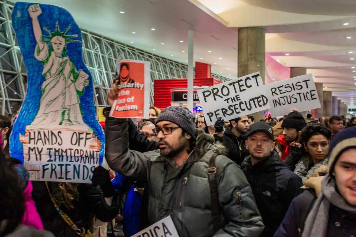 People protest the Trump administration’s travel ban at Kennedy International Airport in January 2017. The inspiration for the Yemeni bodega strike came from the JFK protests.