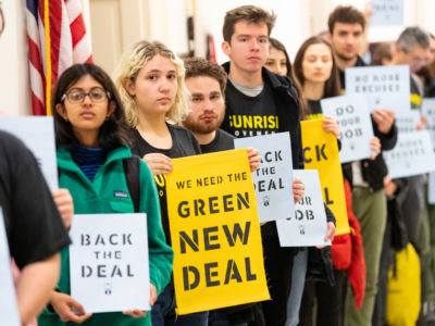 More than 1,000 young protesters lined the halls of Congress and lobbied at congressional offices on Monday to demand that their elected representatives back the Green New Deal.