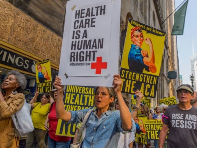 Activists march in New York City on September 5, 2017. Ongoing efforts to sabotage Medicaid and deny coverage to immigrant families will increase the uninsured.