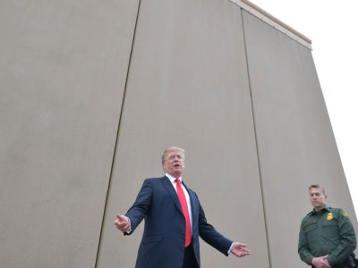 President Trump inspects border wall prototypes with Chief Patrol Agent Rodney S. Scott of the US Border Patrol in San Diego, California, on March 13, 2018.