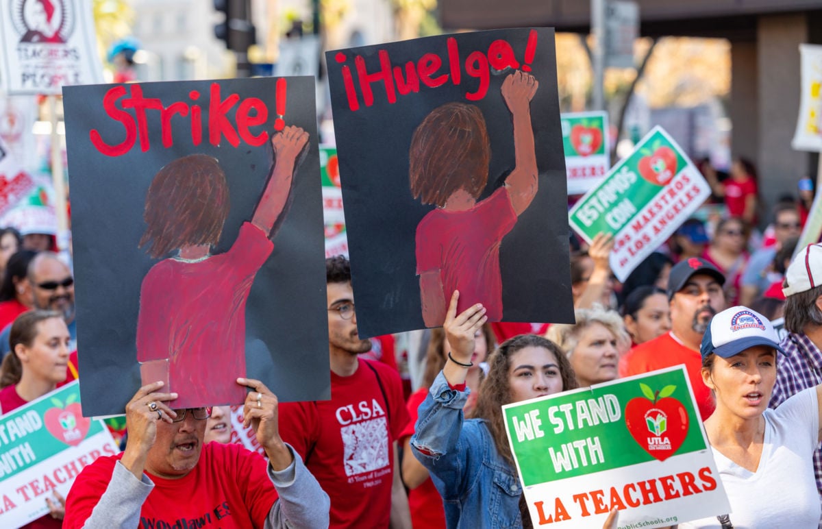 Thousands of teachers, students and union allies march through downtown Los Angeles on December 15, 2018, ahead of a possible strike.