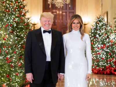 President Donald J. Trump and First Lady Melania Trump are seen in their Official Christmas Portrait on Saturday, December 15, 2018, in the Cross Hall of the White House.