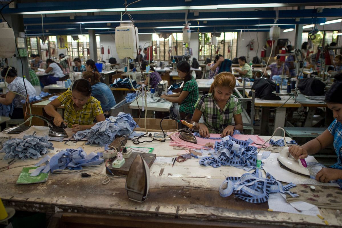 Laborers work at a garment factory in Yangon, Burma, on November 1, 2018.