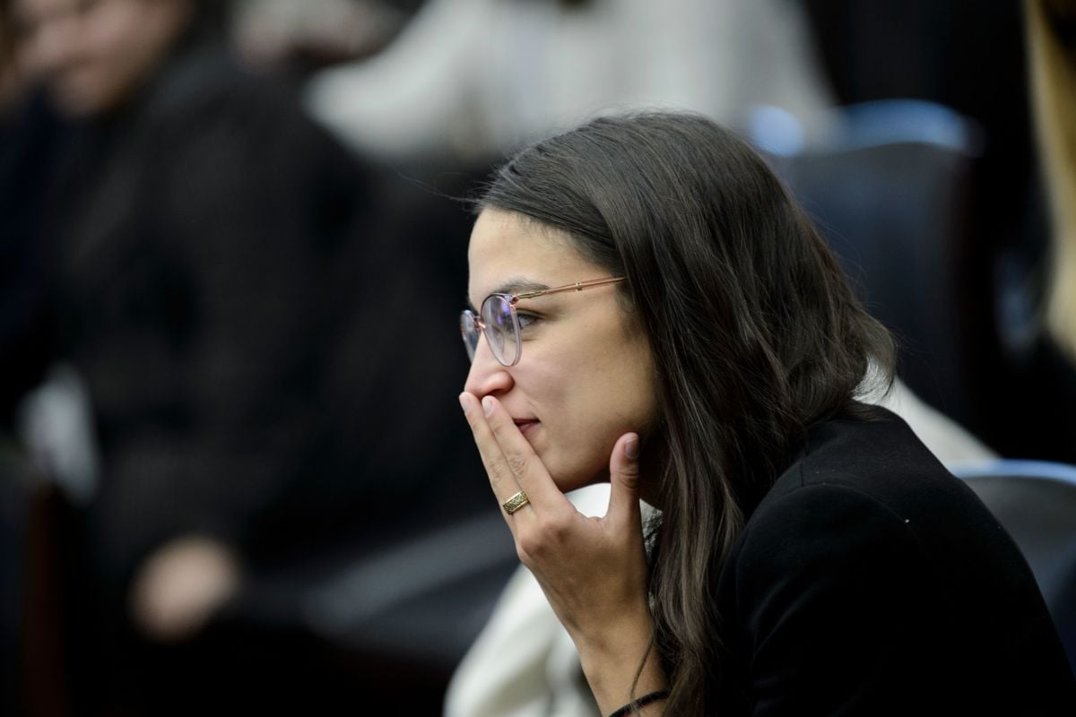 US Representative-elect Alexandria Ocasio-Cortez looks on during the drawing for new offices on Capitol Hill, November 30, 2018, in Washington, DC.