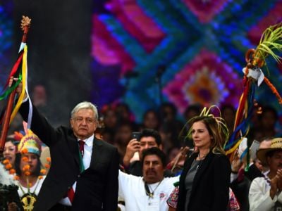 Mexican President Andrés Manuel López Obrador attends a ceremony in which he received a ceremonial staff from Indigenous people, next to his wife Beatriz Gutiérrez Müller, at the Zocalo Square in Mexico City, on December 1, 2018.