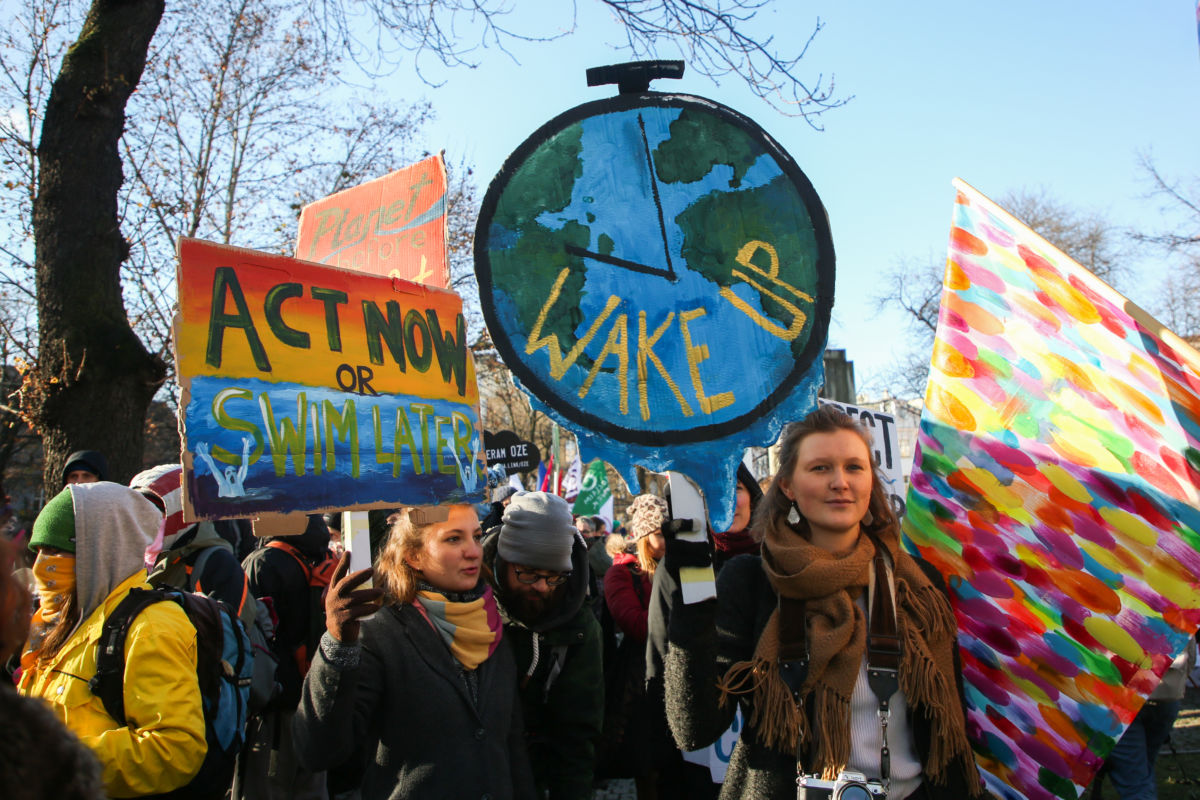 Activists attend the March for Climate which took place during COP24, the 24th Conference of the Parties to the United Nations Framework Convention on Climate Change, in Katowice, Poland, on December 8, 2018.