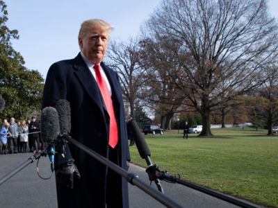 President Trump talks to reporters prior to boarding Marine One as he departs the White House in Washington, DC, on December 8, 2018.