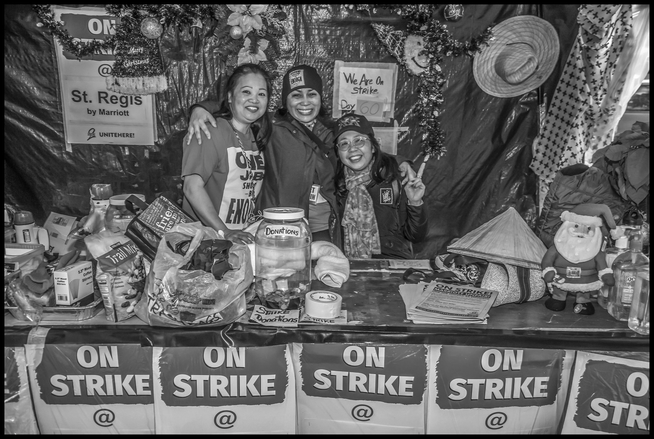 Camucha King and other St. Regis strikers put up Christmas decorations on their picket line when Marriott Corporation stonewalled negotiations at Thanksgiving, as a way to tell the company they were prepared to continue the strike through the holidays.