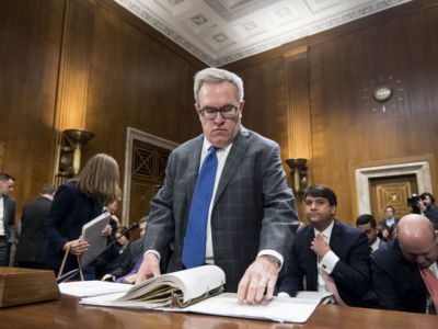 Andrew Wheeler, acting administrator at the Environmental Protection Agency, prepares to testify during a Senate Committee on Environment and Public Works hearing on August 1, 2018. Wheeler has gutted fuel efficiency standards, rolled back carbon emissions rules and deregulated mercury emissions.