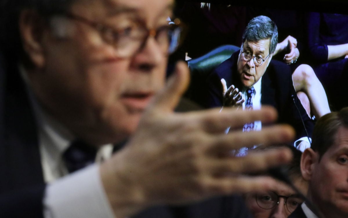 Attorney general nominee William Barr testifies at his confirmation hearing as his image is shown on a television monitor behind him January 15, 2019, in Washington, DC.