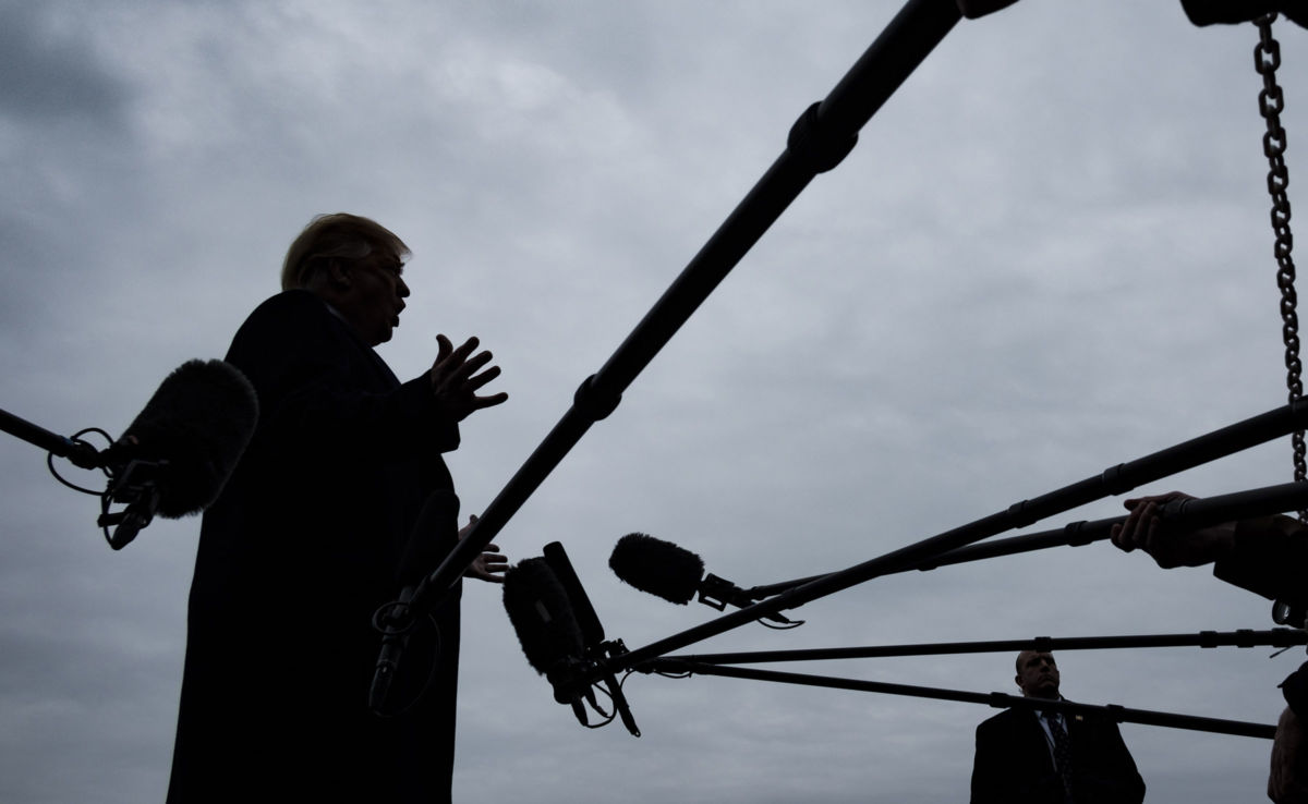 President Donald Trump stops to speak to reporters as he prepares to board Marine One on the South Lawn of the White House on January 19, 2019, in Washington, DC.