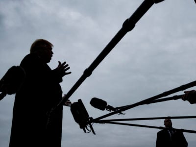President Donald Trump stops to speak to reporters as he prepares to board Marine One on the South Lawn of the White House on January 19, 2019, in Washington, DC.