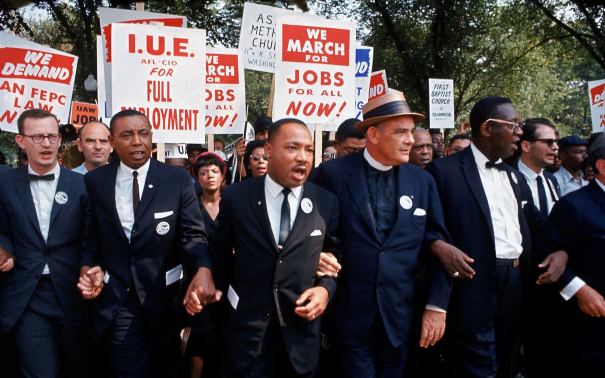 Leaders of March on Washington for Jobs & Freedom marching with signs (R-L) Rabbi Joachim Prinz, unident., Eugene Carson Blake, Martin Luther King, Floyd McKissick, Matthew Ahmann & John Lewis.