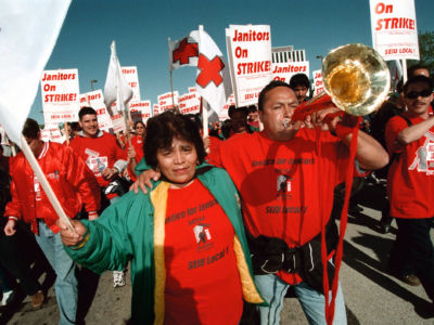 Striking suburban janitors of the Service Employees International Union at a mass rally in Oak Brook, Illinois, April, 25, 2000, Salvadoran immigrants in California were pivotal in building "Justice for Janitors" in 1990.