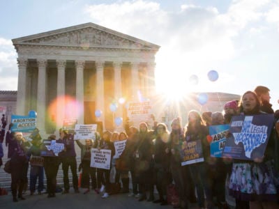 Pro-choice advocates rally outside of the Supreme Court on March 2, 2016, in Washington, DC. We owe it to ourselves — and to the communities that may be struggling just a little bit worse than we are — to do better.