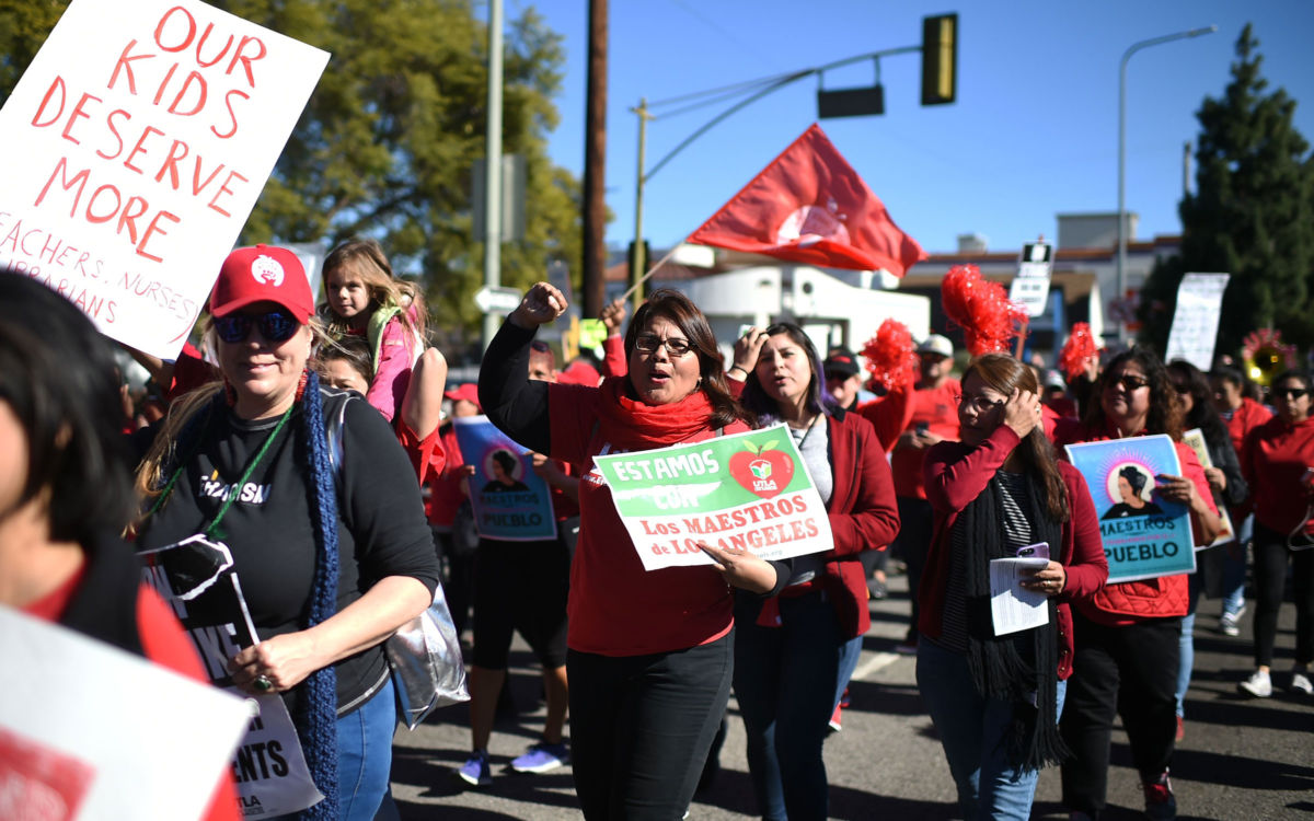 Striking public school teachers and their supporters march during the 34th annual Kingdom Day Parade on Martin Luther King Day, January 21, 2019, in Los Angeles, California.