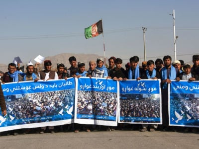 People's Peace Movement members march in the Kandahar Province on January 17, 2019, with banners reading: "No War," "We Want a Ceasefire" and "We Want Peace."