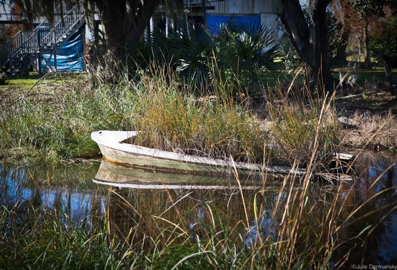 Abandoned boat in a bayou on Isle de Jean Charles.