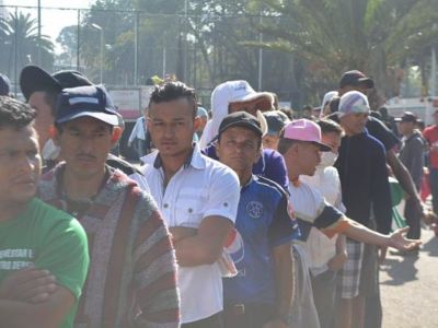 A line of migrants from Honduras, El Salvador and Guatemala wait for breakfast in Mexico City in early November, 2018.