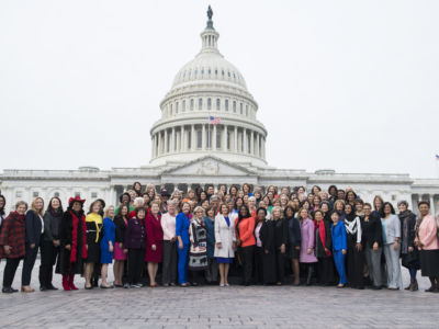 Speaker Nancy Pelosi poses with Democratic women members of the House after a group photo on the East Front of the Capitol on January 4, 2019.